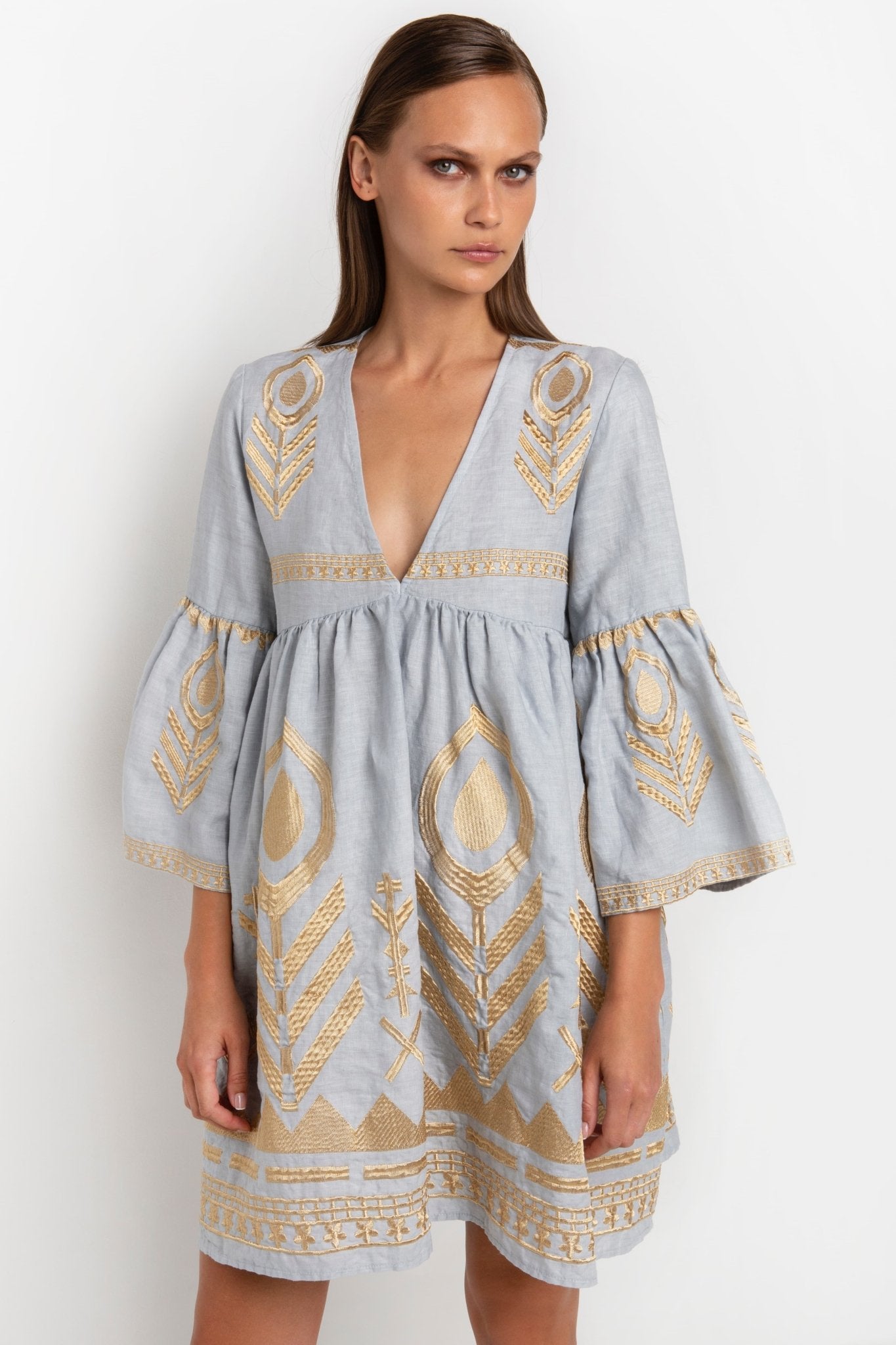 Greek Archaic Kori Kori Grey & Gold Feather Embroidered Dress. Available at Pasha Living