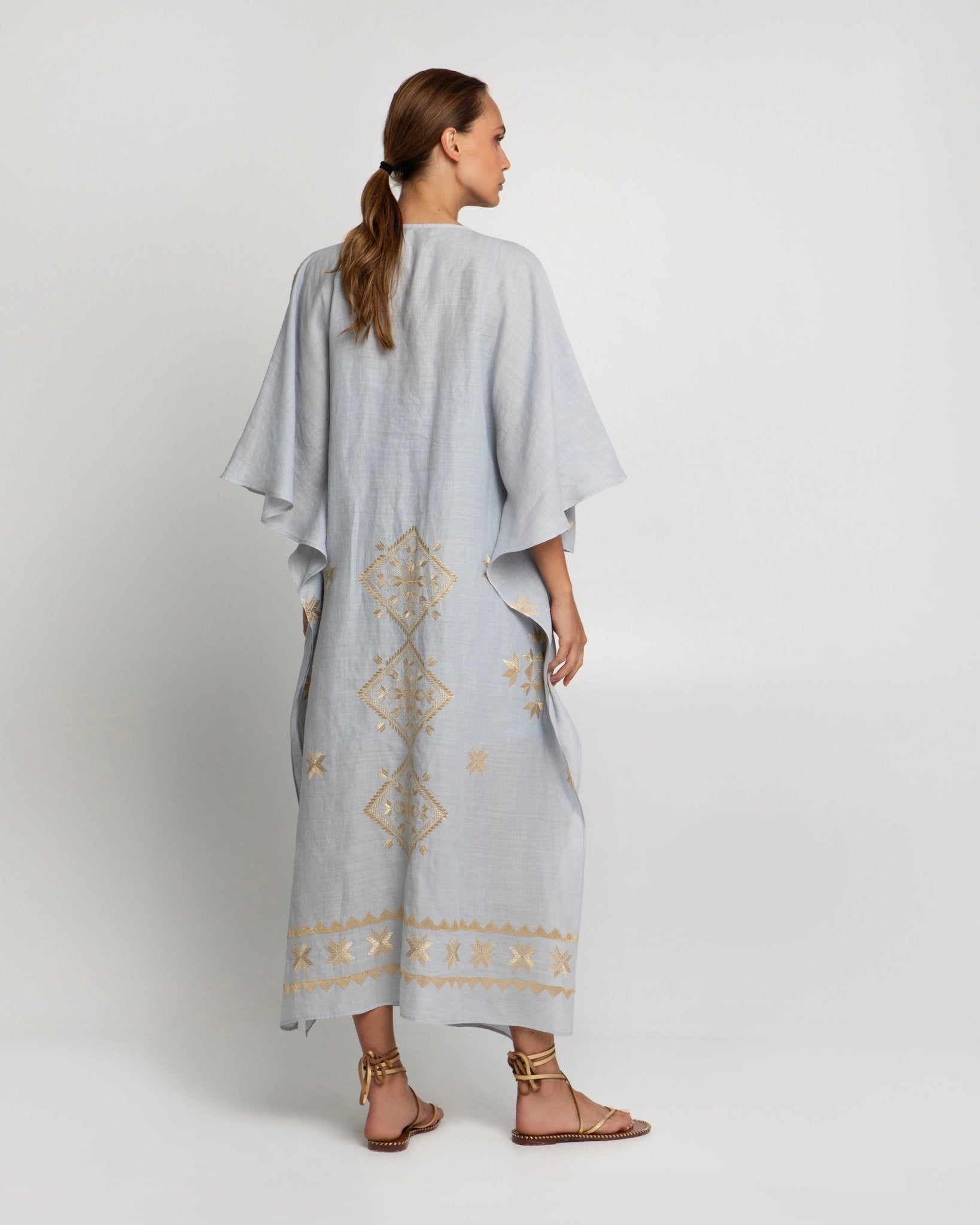 Greek Archaic Kori Lefkada Long Kaftan | Light Grey & Gold. Available at Pasha Living