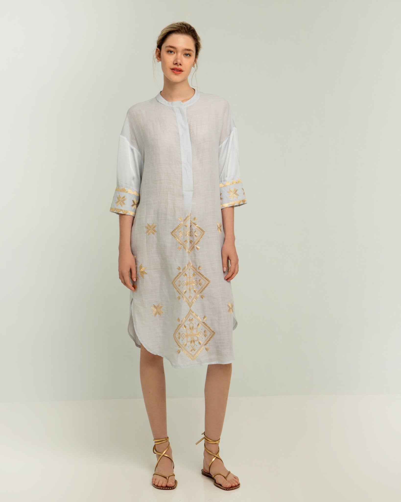 Greek Archaic Kori Lefkada Tunic Dress | Light Grey & Gold. Available at Pasha Living