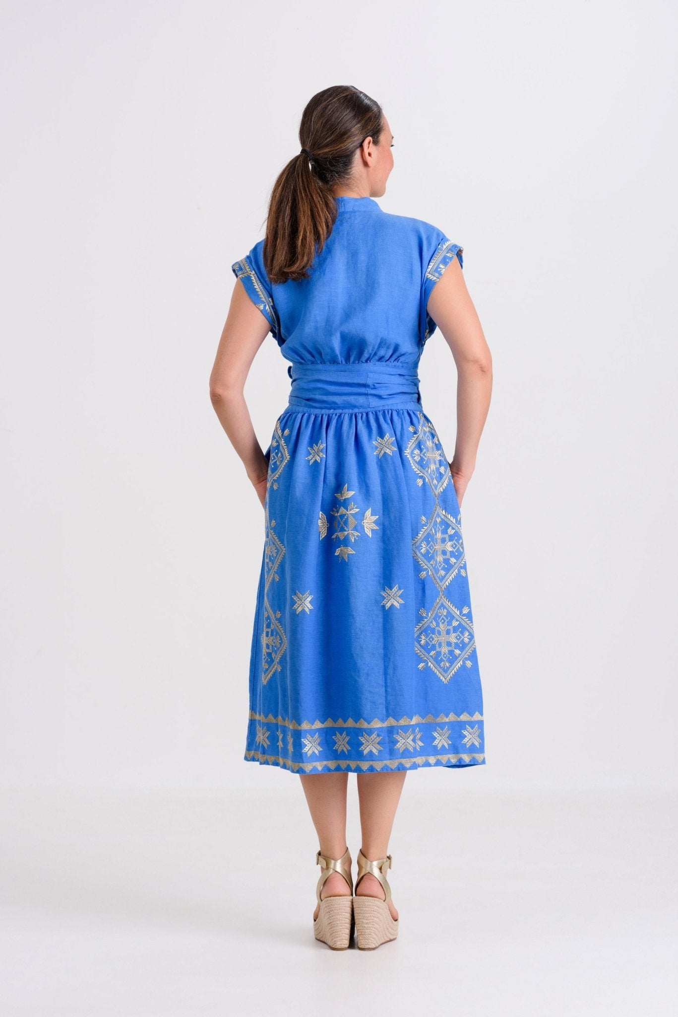 Greek Archaic Kori Lefkada Wrap Dress | Blue & Gold. Available at Pasha Living