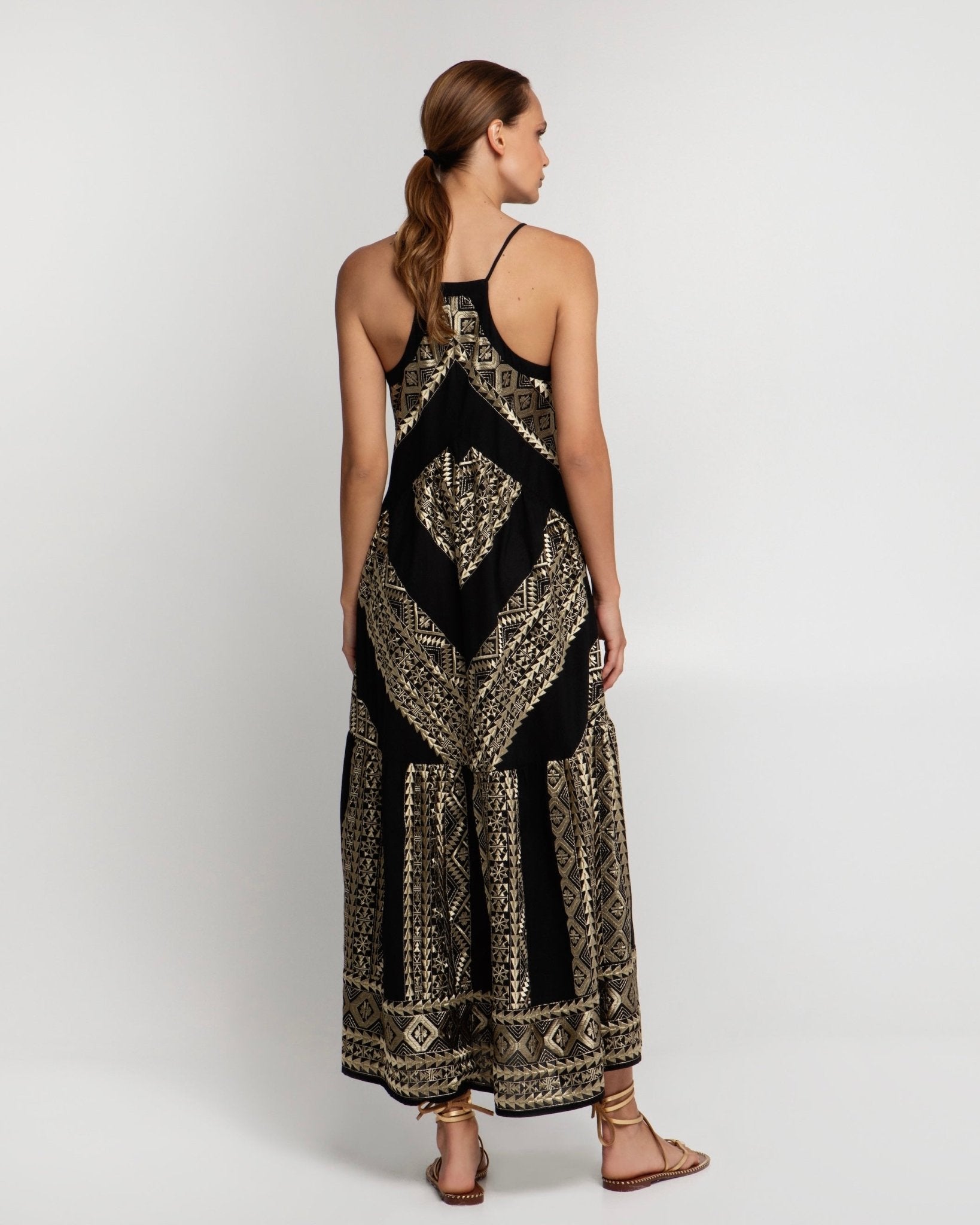 Greek Archaic Kori Long Classic Triangle Dress With Buttons | Black & Gold. Available at Pasha Living