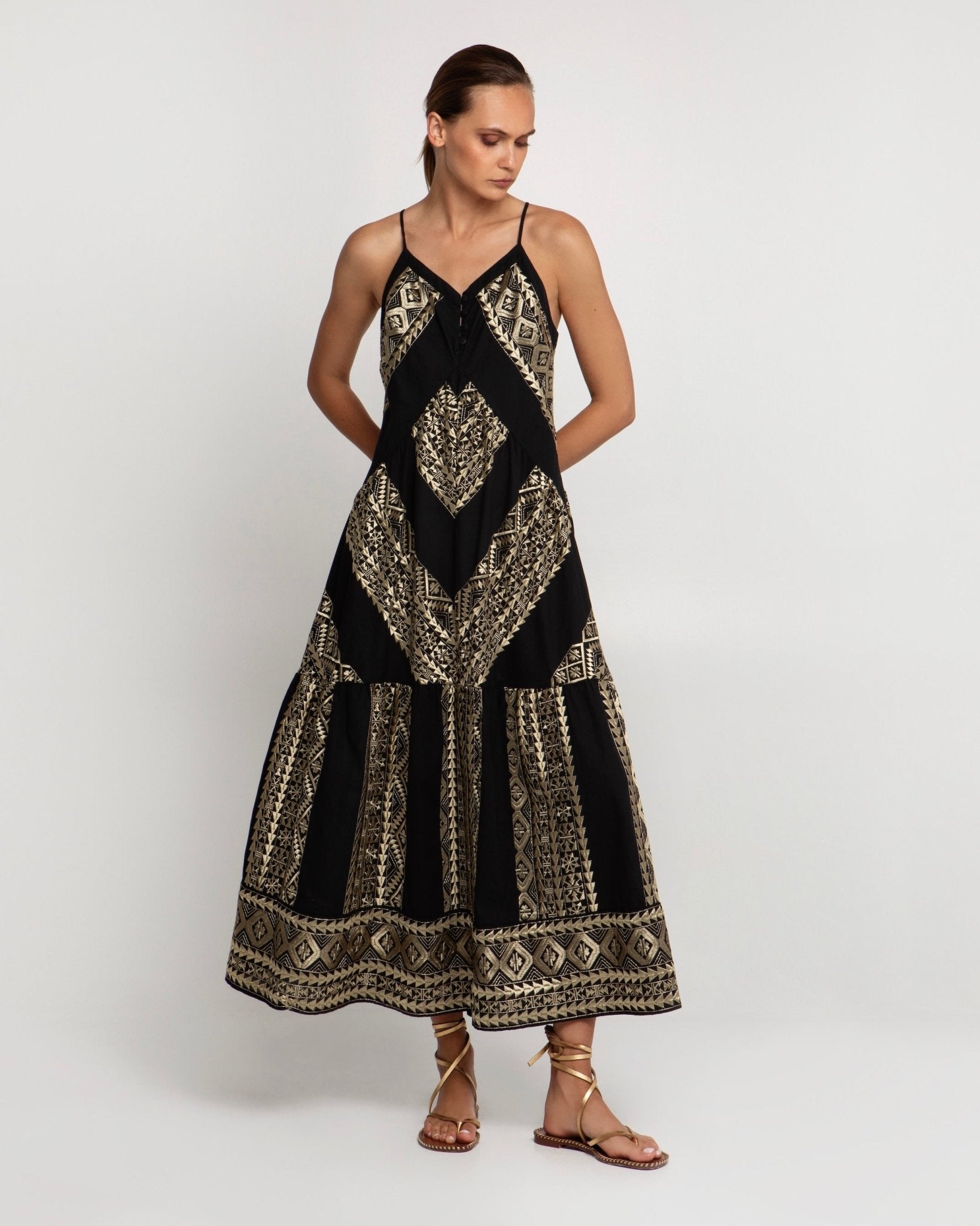 Greek Archaic Kori Long Classic Triangle Dress With Buttons | Black & Gold. Available at Pasha Living