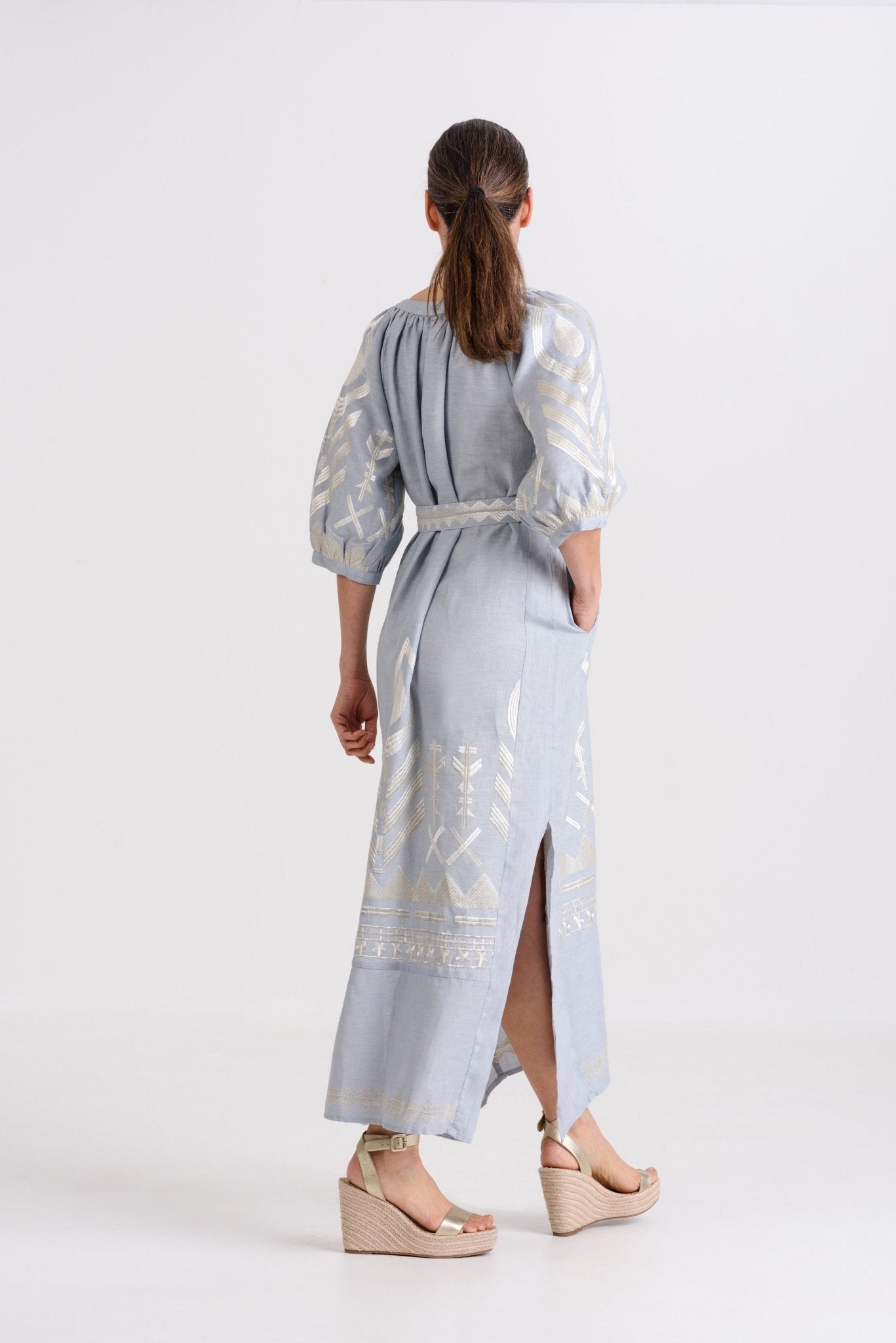 Greek Archaic Kori Long Feather Dress With Chevron Belt | Grey & Champagne. Available at Pasha Living