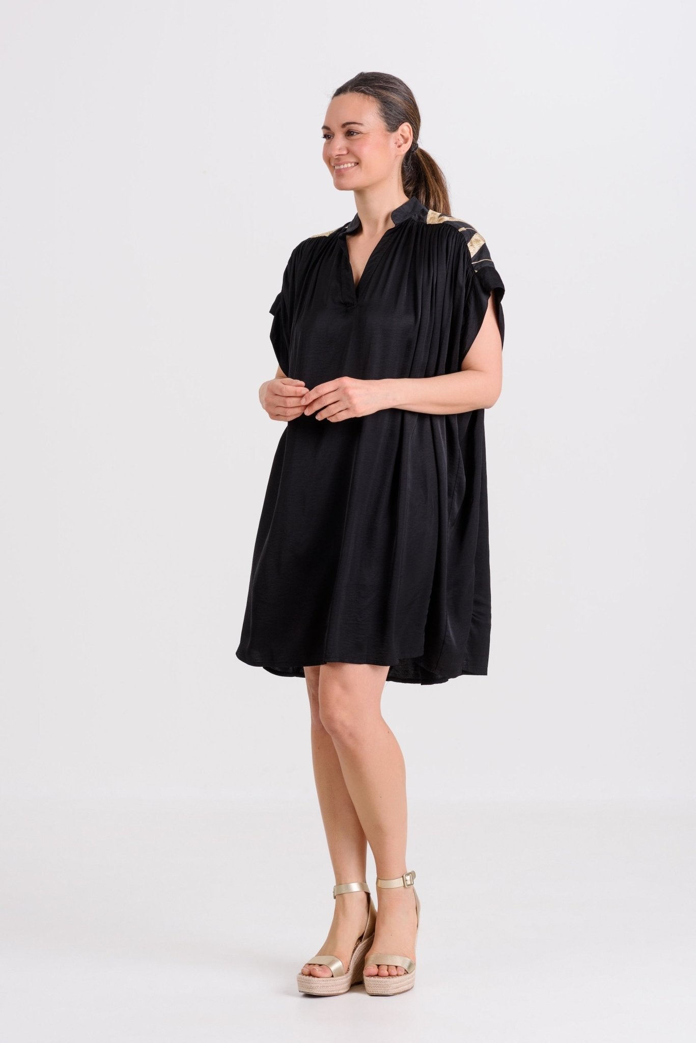 Greek Archaic Kori Roots Silky Dress | Black & Gold. Available at Pasha Living
