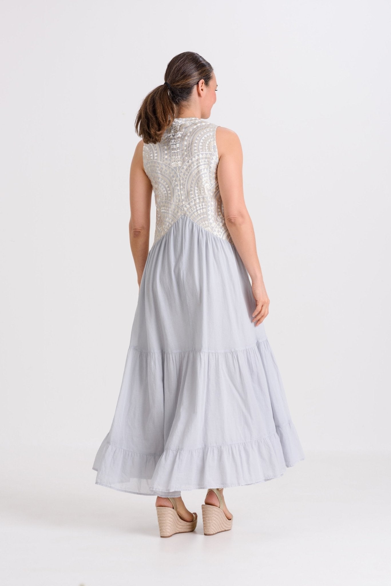 Greek Archaic Kori Sleeveless Voile Maxi Dress | Light Grey & Champagne. Available at Pasha Living