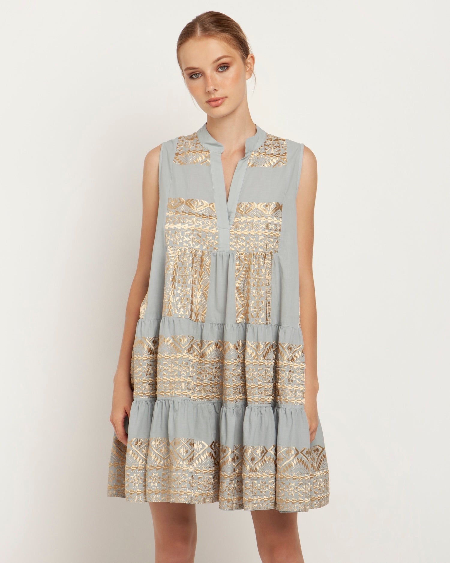 Greek Archaic Kori Classic Triangle Short Dress | Light Grey & Gold. Available at Pasha Living