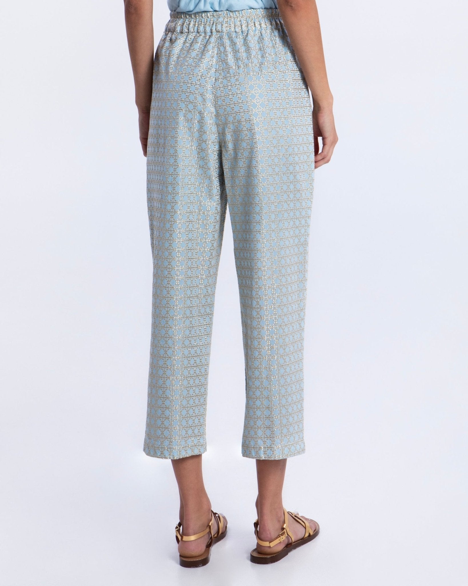 Greek Archaic Kori Cross Trousers | Ciel & Gold. Available at Pasha Living