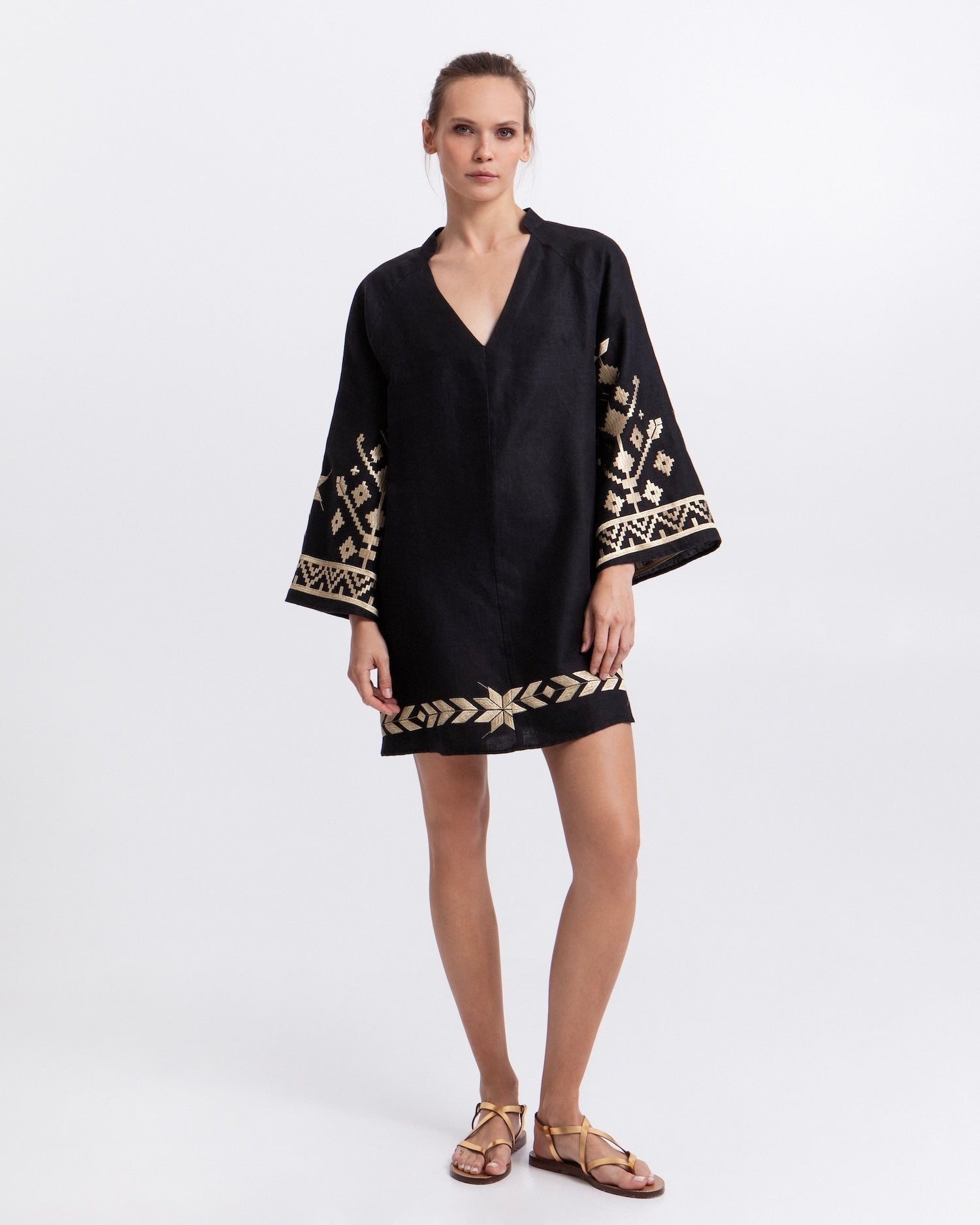 Greek Archaic Kori IOS Mini Bell Sleeve Dress | Black & Gold. Available at Pasha Living