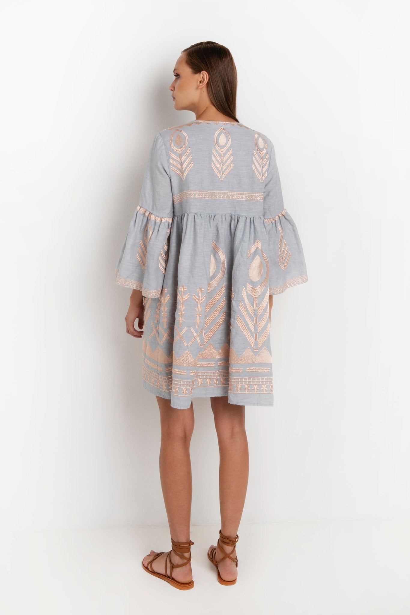 Greek Archaic Kori Kori Grey & Rose Gold Feather Embroidered Dress. Available at Pasha Living