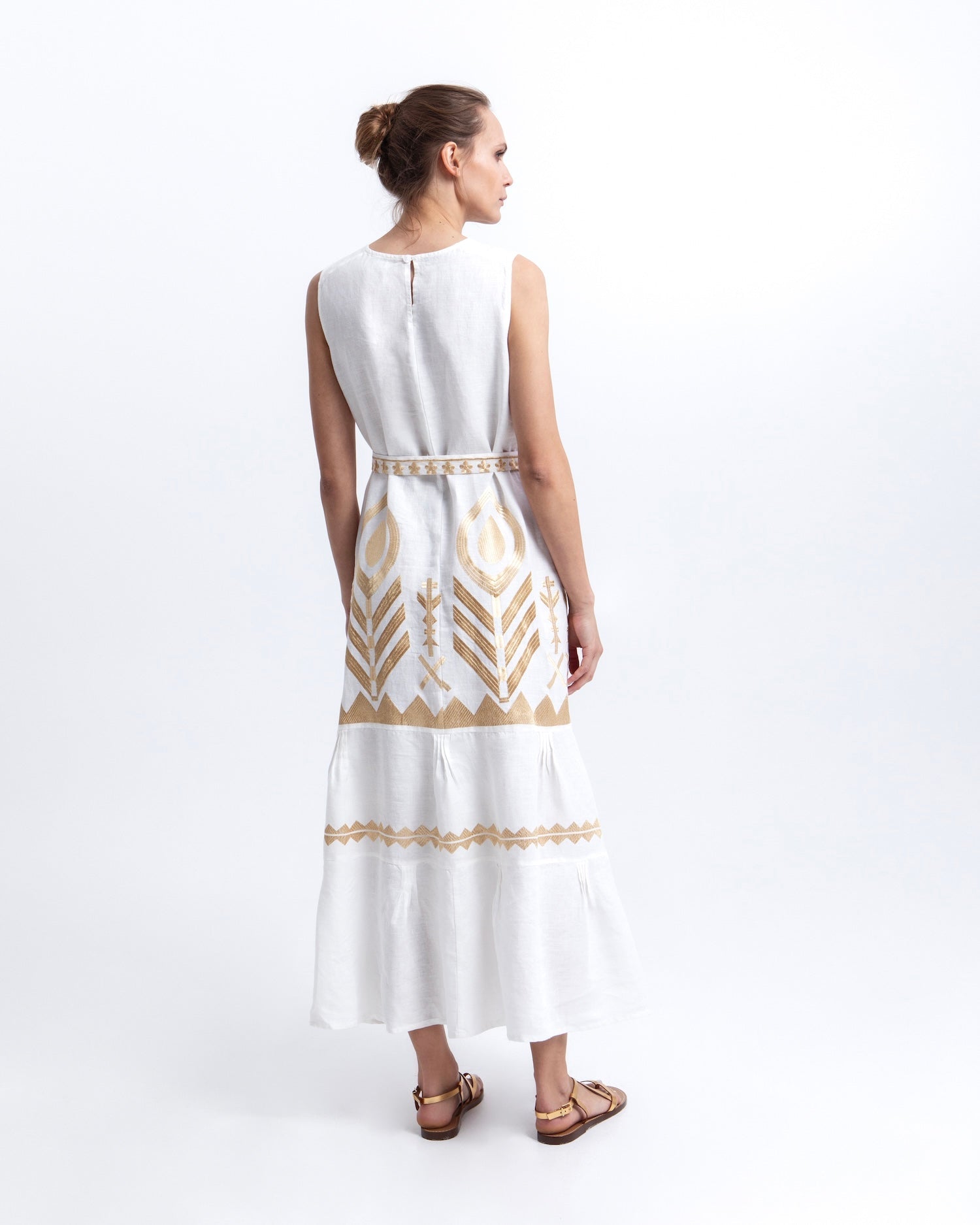 Greek Archaic Kori Maxi Feather White Linen Dress. Available at Pasha Living