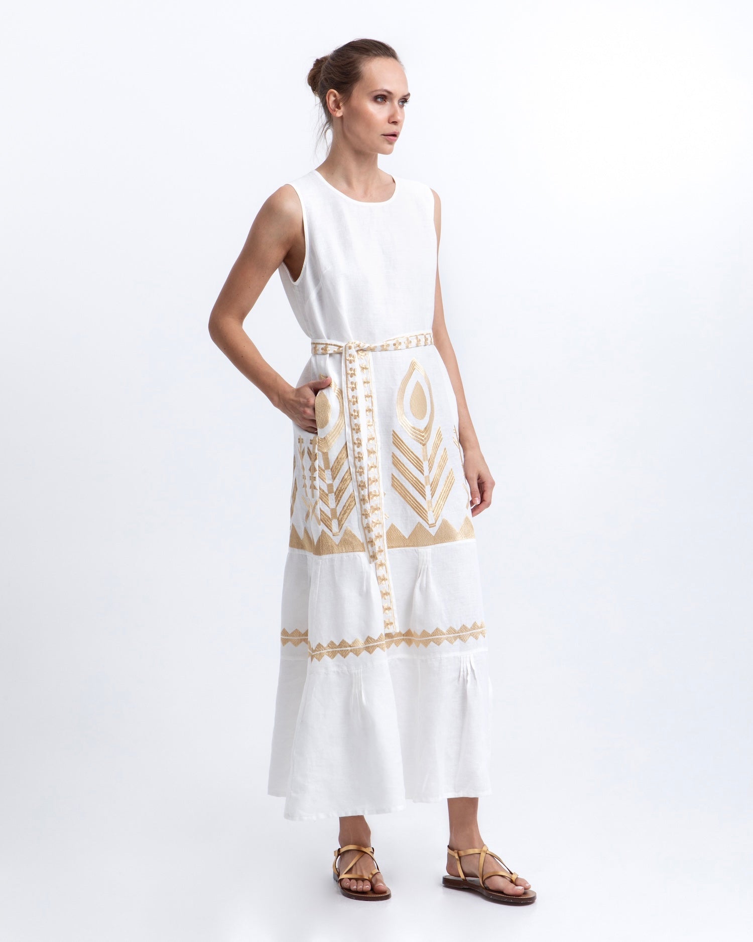 Greek Archaic Kori Maxi Feather White Linen Dress. Available at Pasha Living