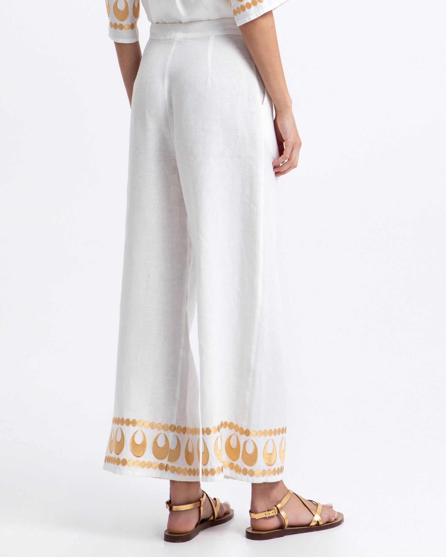 Greek Archaic Kori Selene Pants | White & Gold. Available at Pasha Living