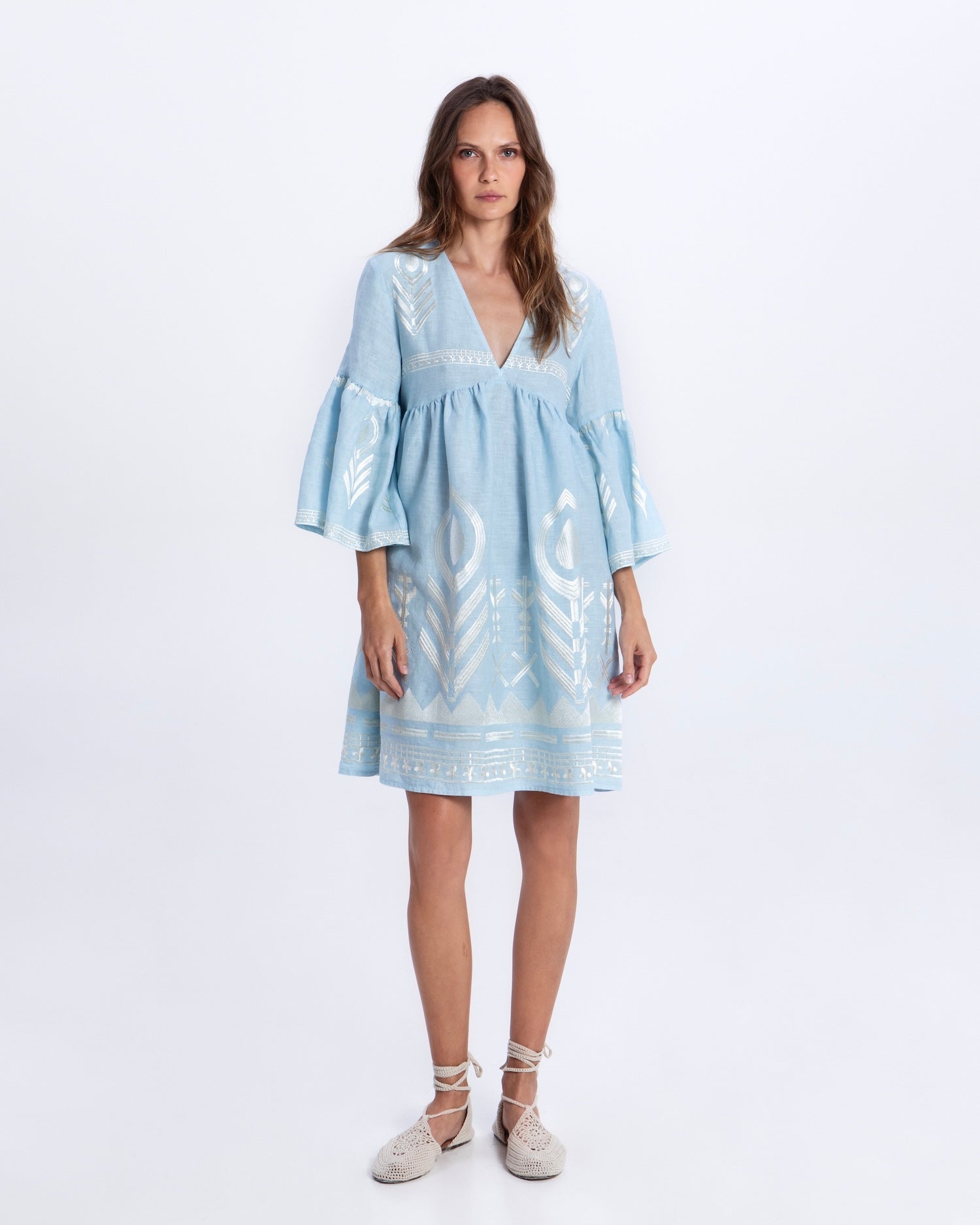 Greek Archaic Kori Short Feather Bell Sleeve Dress | Ciel & Champagne. Available at Pasha Living
