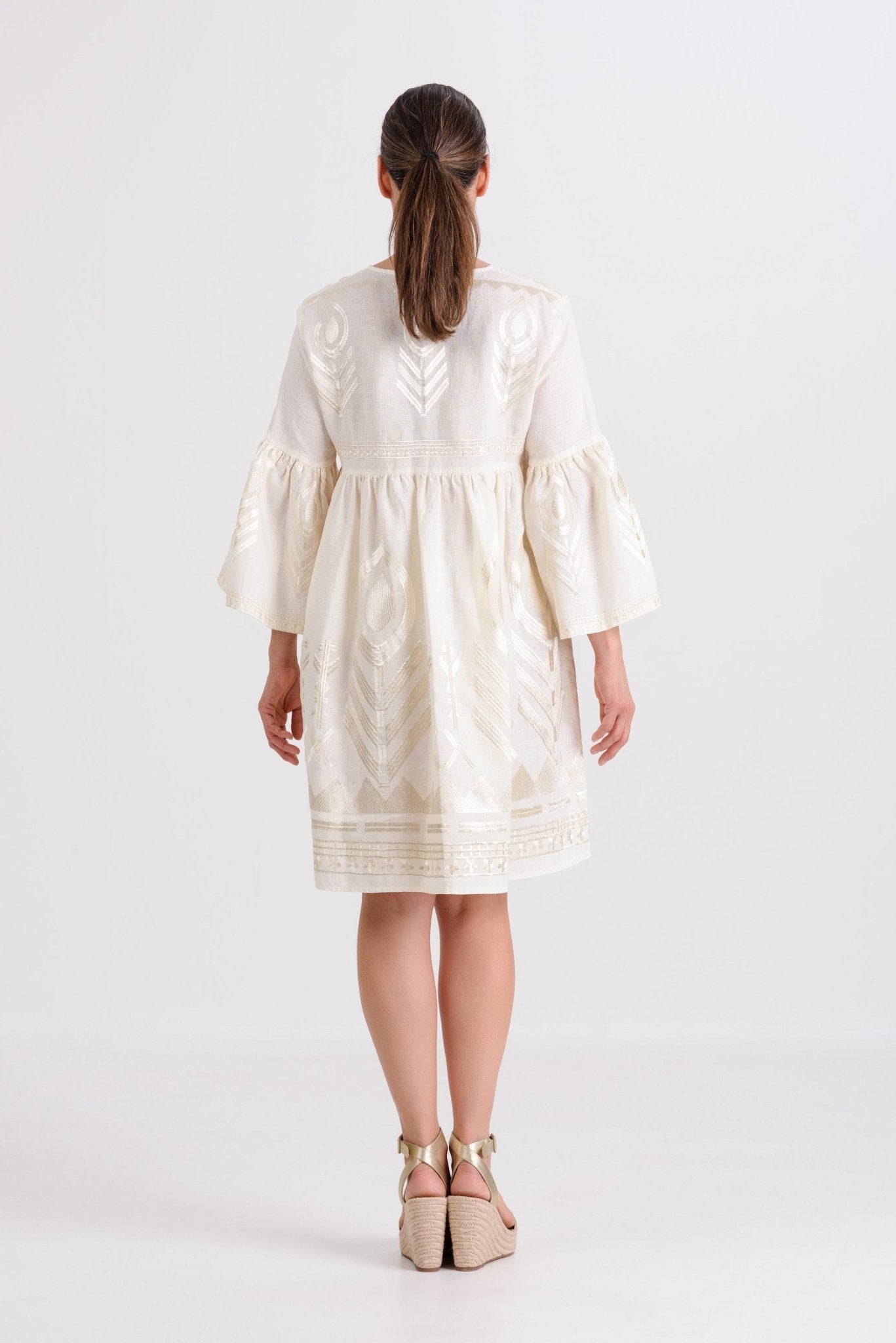Greek Archaic Kori - Short Feather Bell Sleeve Dress | Natural & Champagne - Womens - Crafted from airy linen, ideal for hot climates and relaxed Greek Archaic Kori - Short Feather Bell Sleeve Dress | Natural & Champagne - Womens - Crafted from airy linen, ideal for hot climates and relaxed