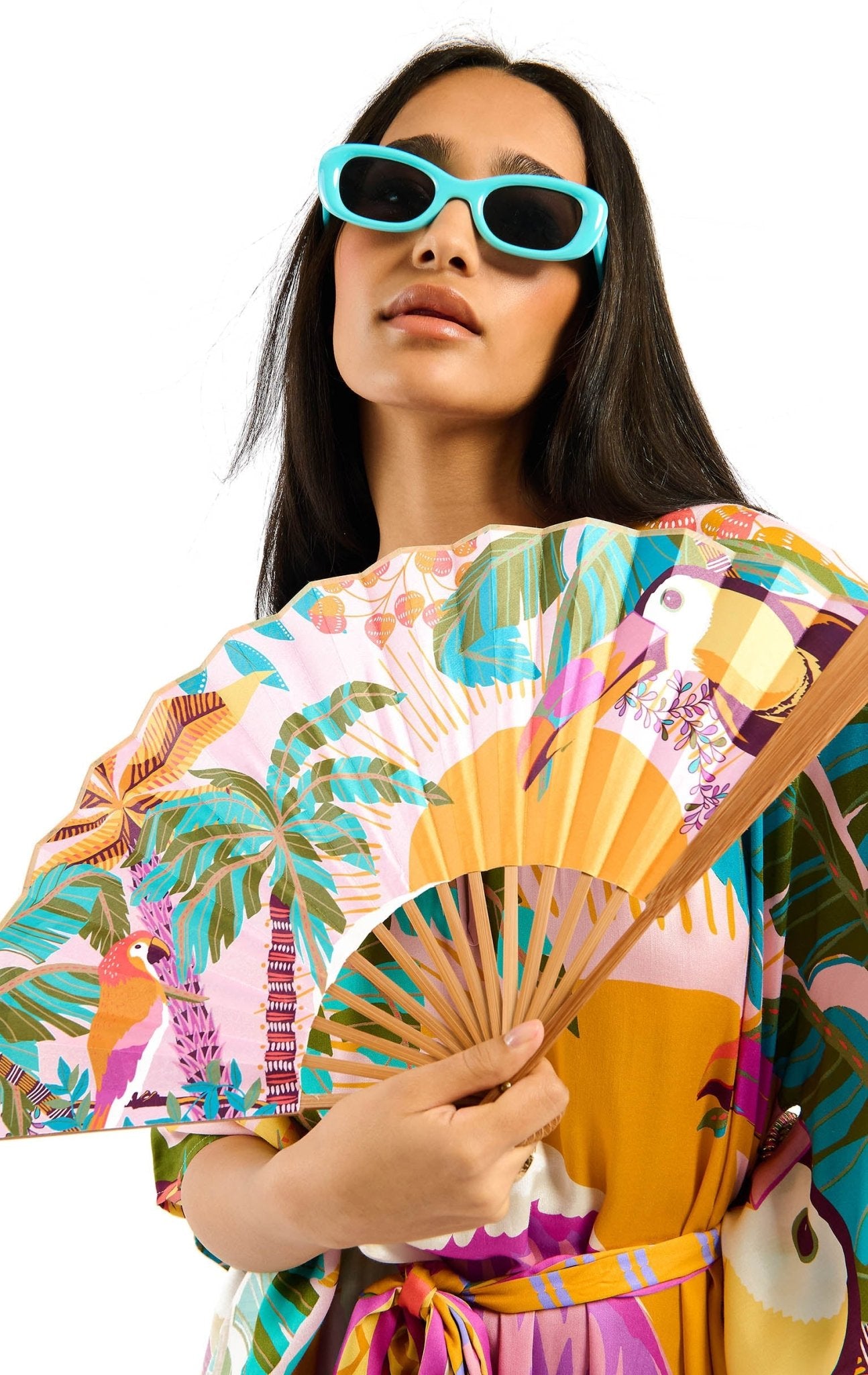 Wild Tropical Print Hand Fan | Pink. Available at Pasha Living